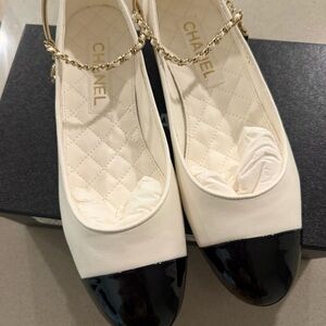 CHANEL Cream Leather Flats with Black Patent Cap-Toe and Gold Chain Strap